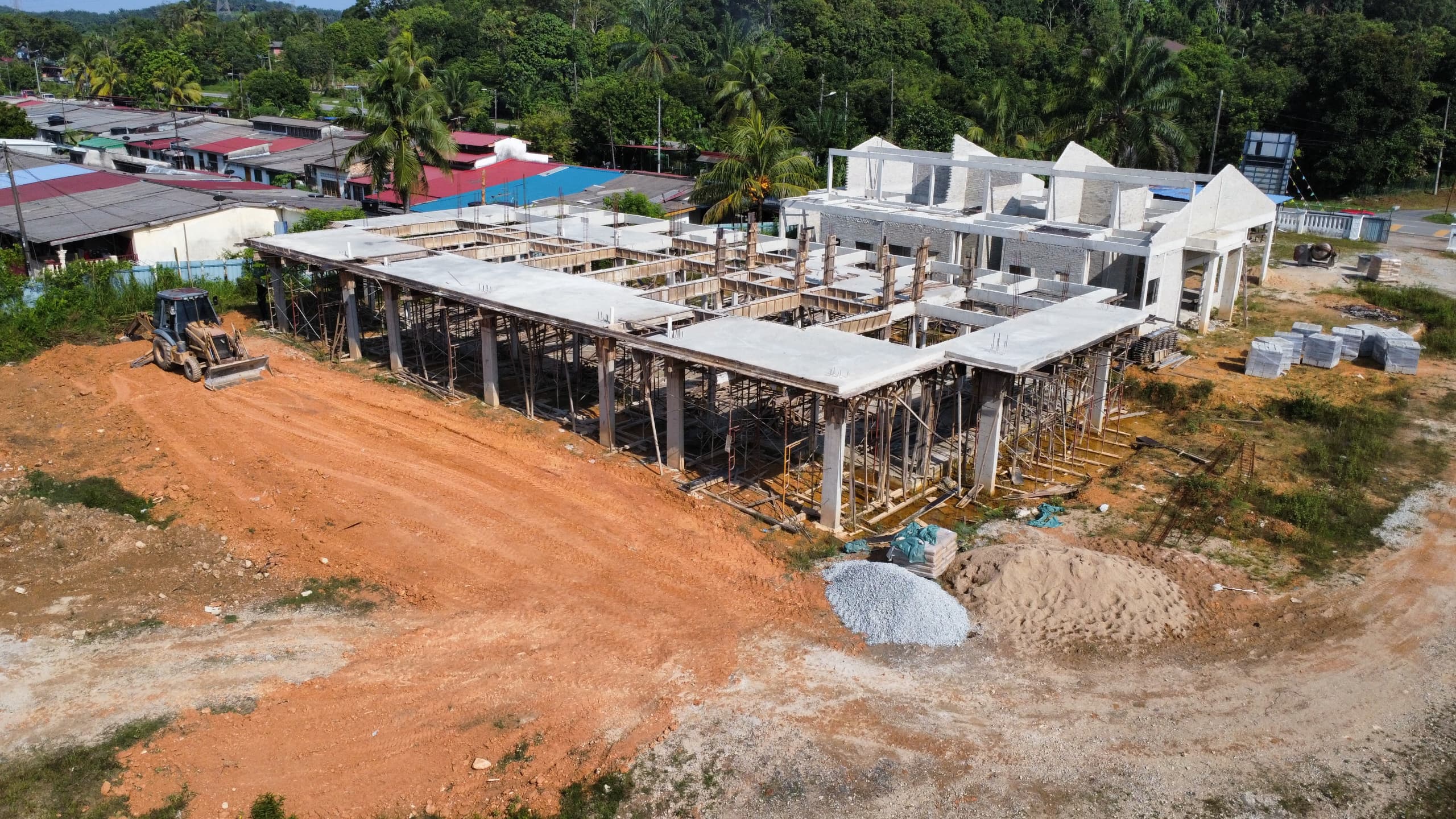 Aerial view of construction site showing foundation work