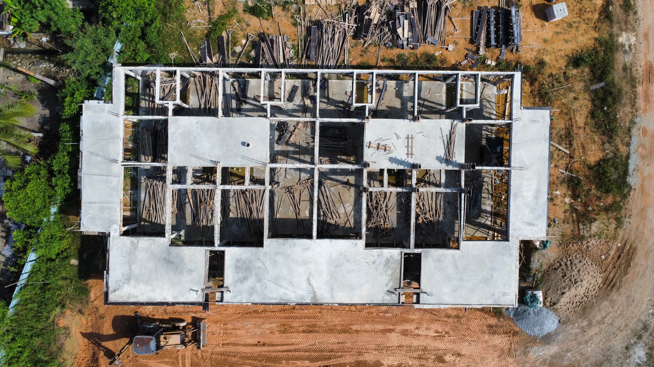 Aerial view of another construction site showing concrete foundation
