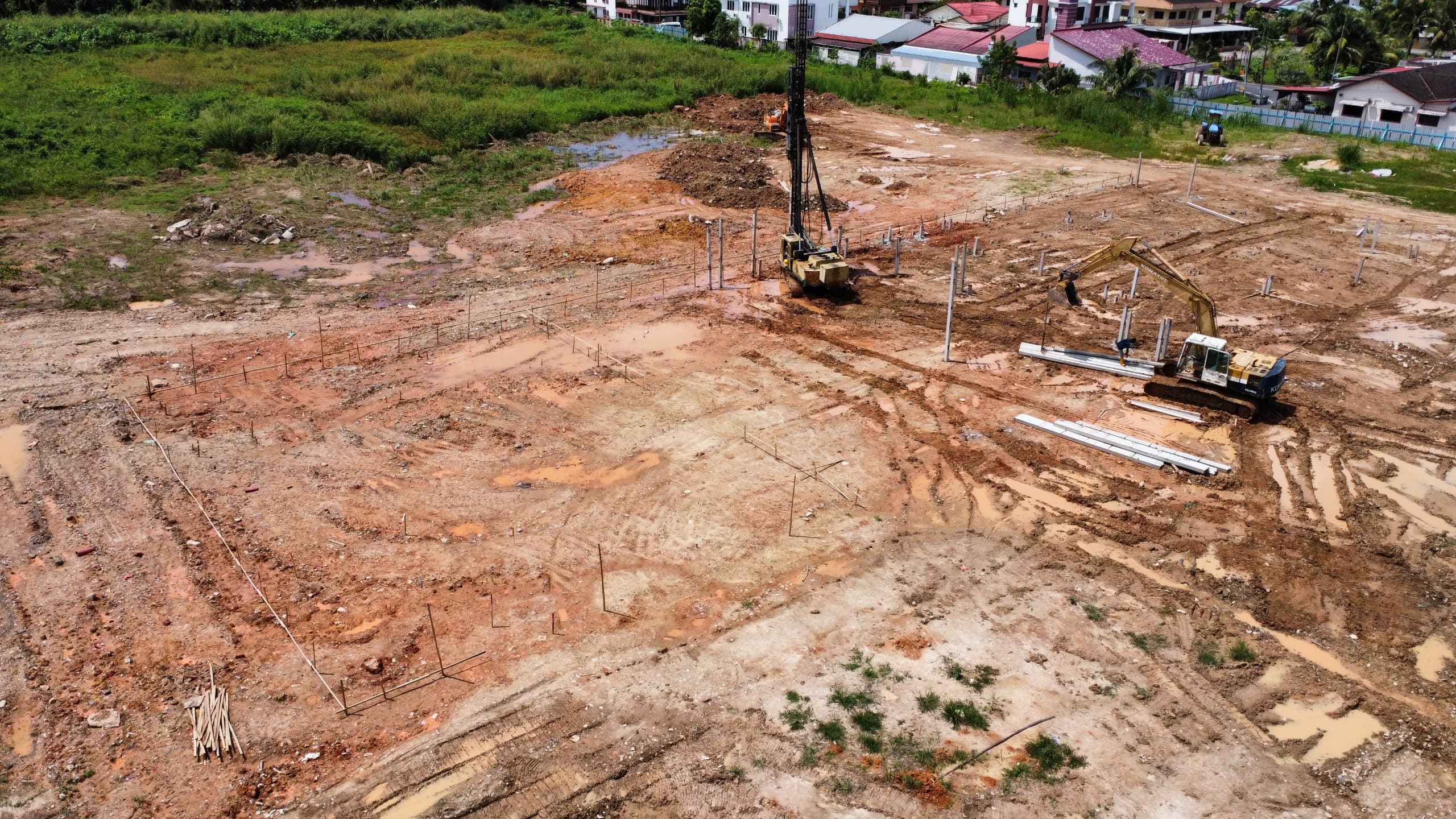 Close-up of foundation work with drilling equipment